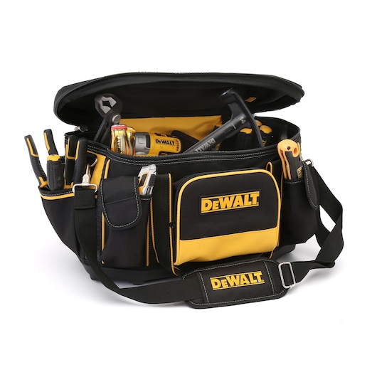 A DEWALT branded black and yellow tool bag filled with various hand tools, including pliers, screwdrivers, a tape measure, and a hammer, with multiple pockets and a shoulder strap.