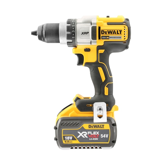 A yellow and black cordless DEWALT power drill with an 18V XR FLEXVOLT 54V lithium-ion battery, model DCD991T2. The drill features a brushless motor and ergonomic handle.