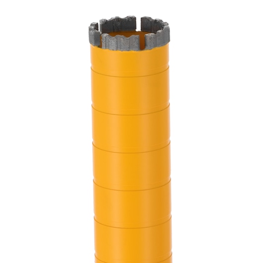 Yellow cylindrical DEWALT core drill bit with segmented cutting edge for masonry or concrete drilling.