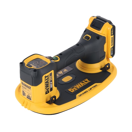 A DEWALT-branded cordless GRABO lifter tool with an 18V battery, used for lifting and handling smooth, flat materials. The tool is predominantly black and yellow with a digital display and ergonomic handle.