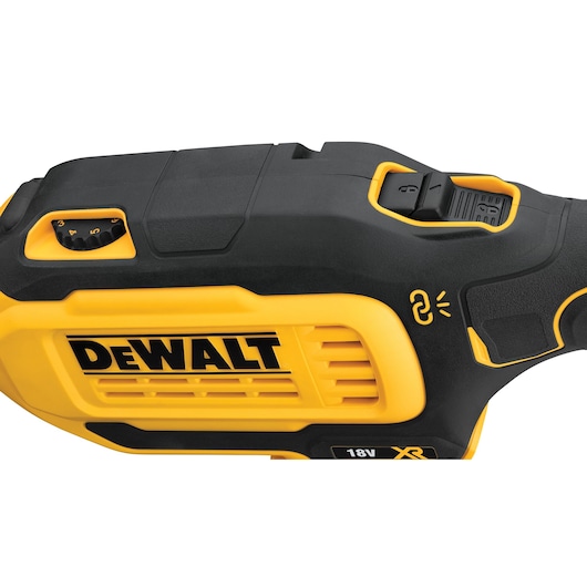 Close-up view of a DEWALT 18V XR tool, showing the yellow and black casing, brand logo, control dial, and switch.