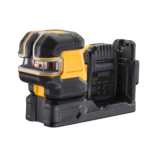 DEWALT yellow and black laser level tool on a charging base, displayed on a white background.