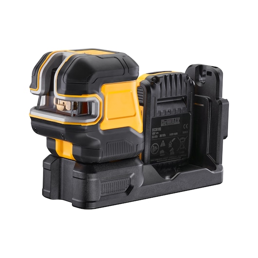 DEWALT laser level tool with a yellow and black design, placed on a charging dock against a white background.