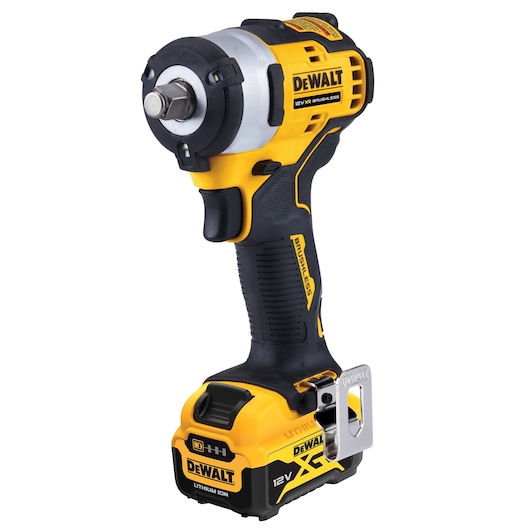A DEWALT 12V XR brushless cordless impact wrench with a yellow and black design, featuring a battery pack at the base and a sturdy metal belt clip.
