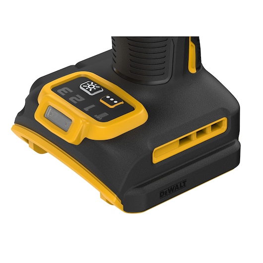 Close-up of DEWALT tool base with control buttons and LED indicator on black and yellow casing.