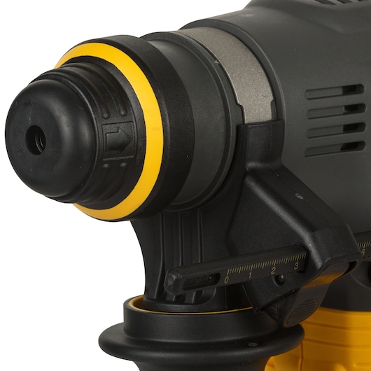 Close-up of DEWALT DCH333NT rotary hammer head in yellow and black with depth gauge visible.