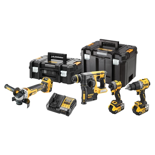 DEWALT tool kit with grinder, drill, impact driver, batteries, charger, and two black storage cases.
