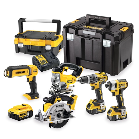 DEWALT tool kit with drill, saw, flashlight, batteries, charger and two storage cases on white background.