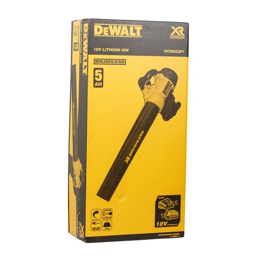 Front view of a DEWALT XR Brushless 18V Lithium Ion blower in its original yellow and black box, model number DCM562P1. The packaging highlights a 5Ah battery, brushless motor, and includes one battery and one charger.