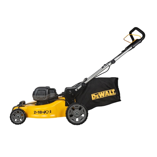 A DEWALT battery-powered lawn mower with a yellow base, black wheels, and a black grass collection bag. The handle is silver with a black grip and DEWALT branding on the bag.