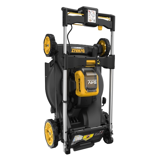 DEWALT lawn mower shown folded upright for compact storage on white background.