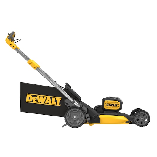 Side view of a DEWALT cordless lawn mower with black and yellow design and large rear grass bag.