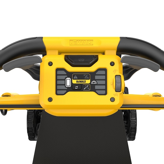 Close-up of DEWALT lawn mower control panel with buttons and handle in yellow and black.
