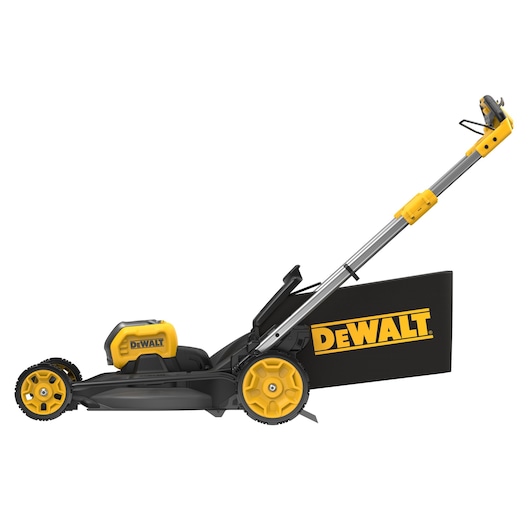 Side view of a DEWALT cordless lawn mower with yellow wheels and a black grass catcher.