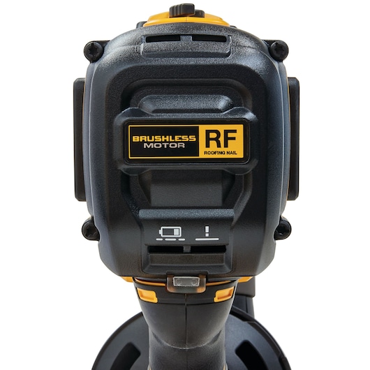 Close-up of a DEWALT brushless motor roofing nailer showing the front label and control switch.