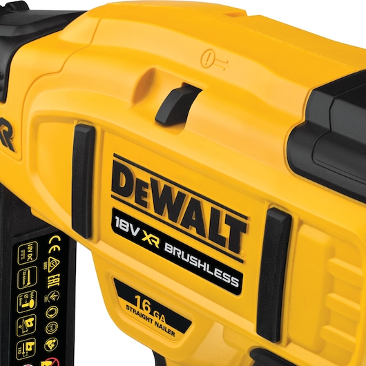 Close-up of a yellow DEWALT 18V XR Brushless 16 GA straight nailer power tool.