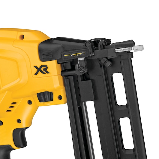 Close-up of a DEWALT XR nail gun, showing trigger, magazine, and adjustment dial, part of the DCN662N model.