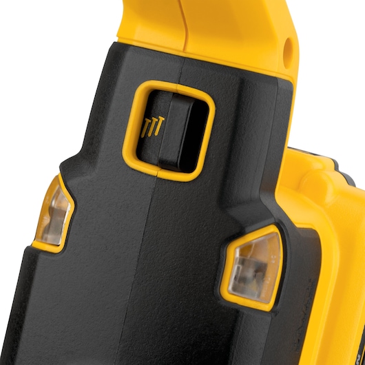 Close-up of DEWALT DCN662N tool showing a yellow and black switch and LED indicators.