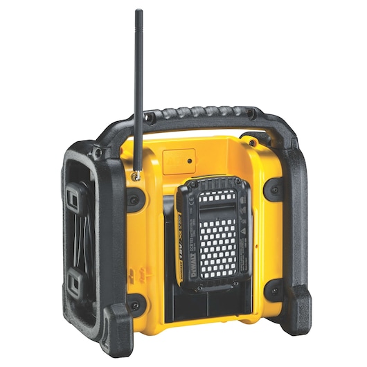 Compact yellow DEWALT jobsite radio with antenna, rugged frame, and battery compartment, back view.