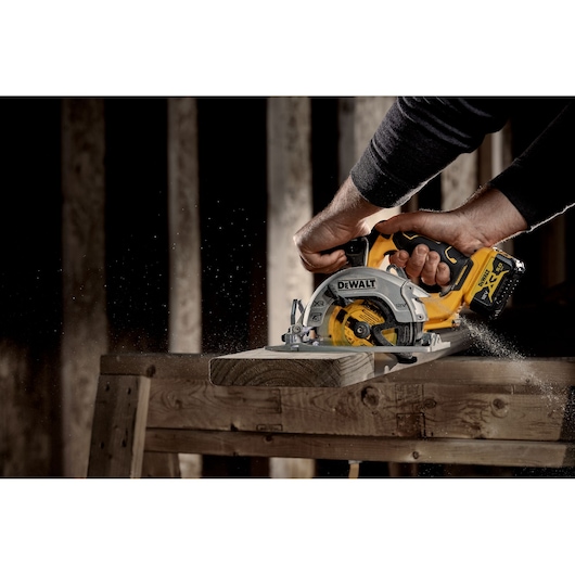 DEWALT circular saw DCS512P2-QW, DCS512P2 cutting wood in action. Photography category. EMEAANZ region.