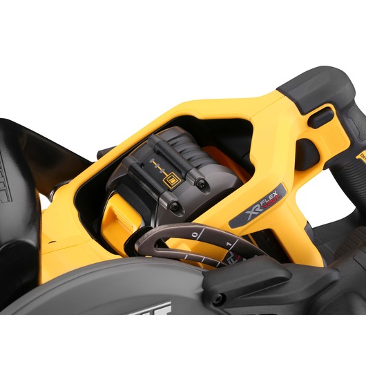Close-up of a DEWALT XR FLEXVOLT power tool, showing control dial and motor housing in yellow and black.