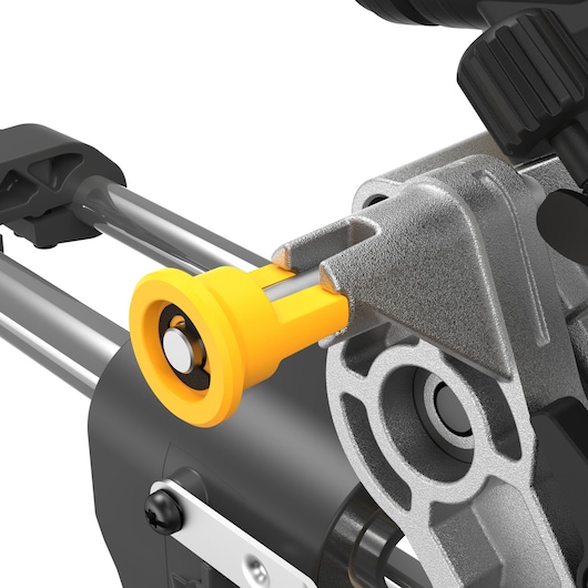 Close-up of DEWALT DCS781N saw part showing yellow adjustment knob and metal components.