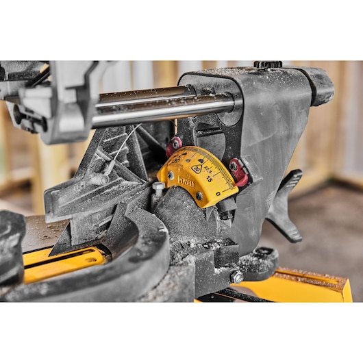 DEWALT saw close-up, showing angle gauge. SKUs: DCS781X2-QW, DCS781X2. Photography category.