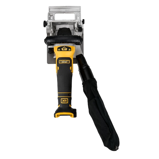 Front view of a DEWALT cordless biscuit joiner tool with a yellow and black handle and an attached dust collection bag.