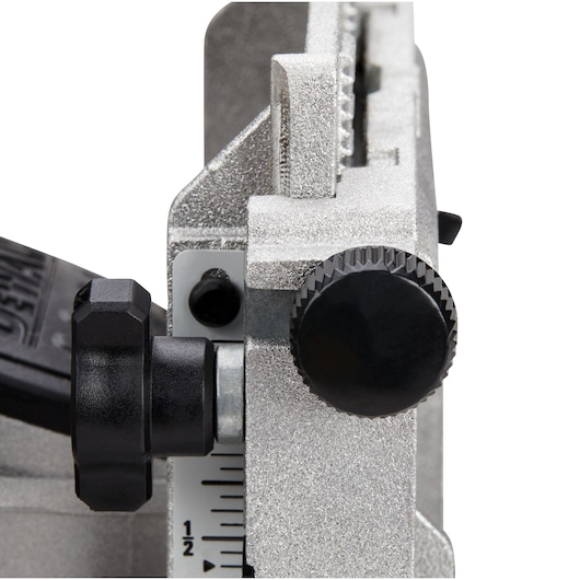 Detail of DEWALT photography tool adjustment, DCW682P2-QW, DCW682P2, close-up of knobs and scale.