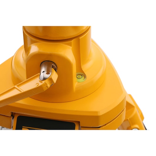 Close-up of a DEWALT tripod mount with yellow finish and built-in bubble level.