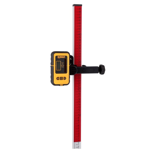 A DEWALT digital laser detector mounted on a red and silver measuring staff, used for leveling and alignment in construction and surveying.