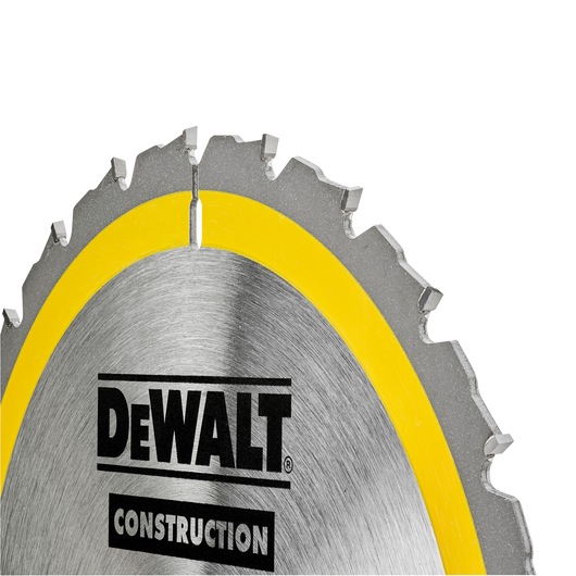 Close-up of DEWALT DT1952 circular saw blade edge with yellow ring and sharp teeth.