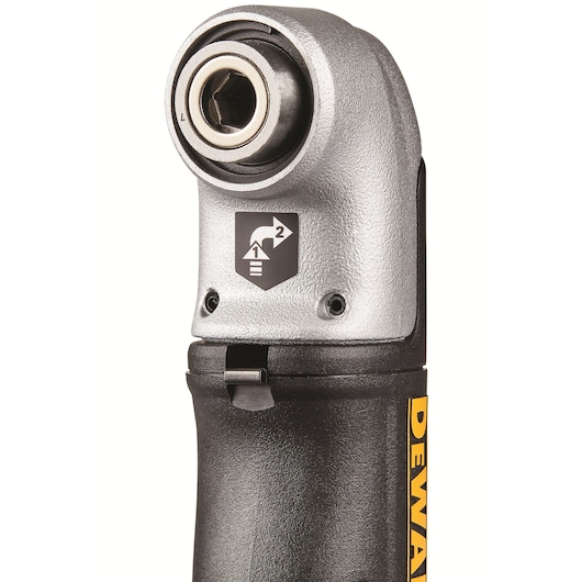 Close-up of a DEWALT right angle drill attachment, showing the metallic head with a hex opening and a two-speed gear selector symbol on the front.