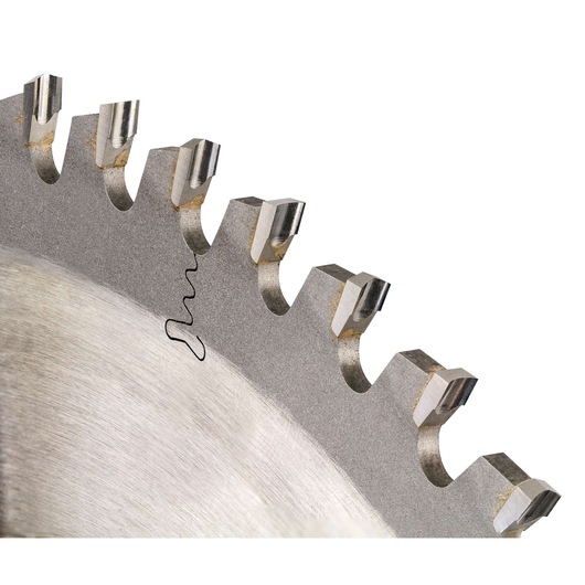 Close-up view of the teeth of a circular saw blade, showing sharp metal tips and a precision cut edge.