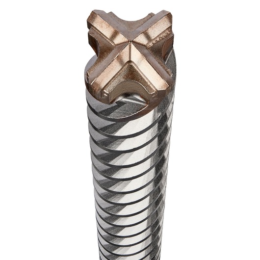 Close-up of the tip of a DEWALT DT60816 drill bit, featuring a four-cutter head with spiral fluting, used for concrete or masonry drilling.