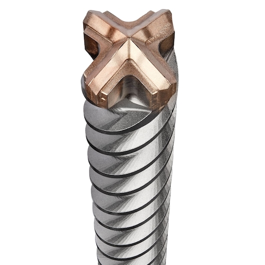 Close-up view of a DEWALT masonry drill bit with a spiral design and a multi-edged cutting tip.