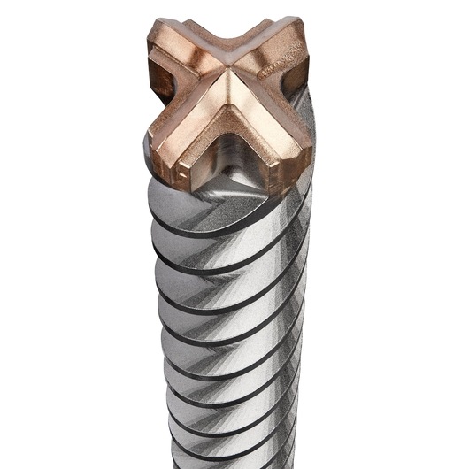 Close-up view of a DEWALT drill bit with a copper-colored, cross-shaped cutting tip and spiral grooves along the shaft.