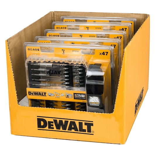 A cardboard display box containing multiple DEWALT DT70703 sets of assorted screwdriver bits, packaged in clear plastic cases with yellow branding.