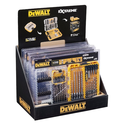 Display box containing multiple DEWALT Extreme Tough Case sets, each with assorted drill bits and accessories organized in transparent plastic cases. The packaging features yellow and black DEWALT branding and images of the cases and storage system.