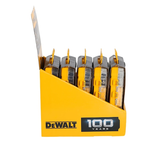 Yellow DEWALT display box with five tool cases, celebrating 100 years, viewed from the side.