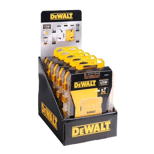 Display box containing multiple DEWALT Tough Case sets for drill and screwdriver bits. The display features the DEWALT logo and product information, with yellow and black packaging.