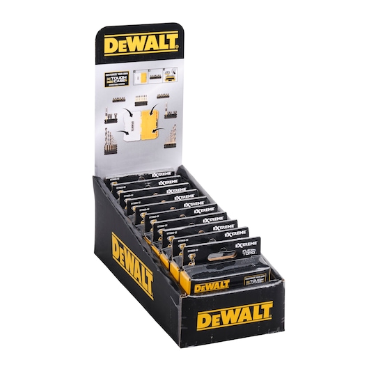 A product display box containing multiple packs of DEWALT Extreme FlexTorq screwdriver bit sets. The black and yellow display shows the DEWALT branding on the front and sides, with individual packs neatly arranged inside.