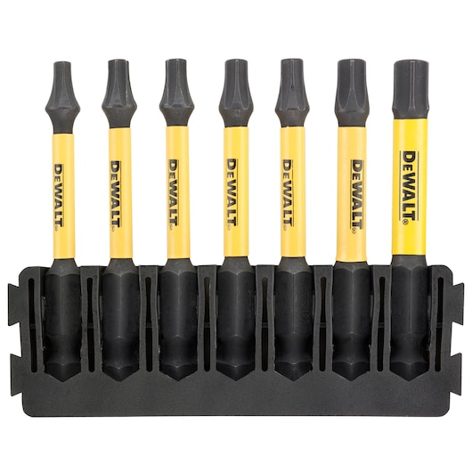Six DEWALT screwdriver bits with yellow shafts in a black holder, arranged upright in a row.