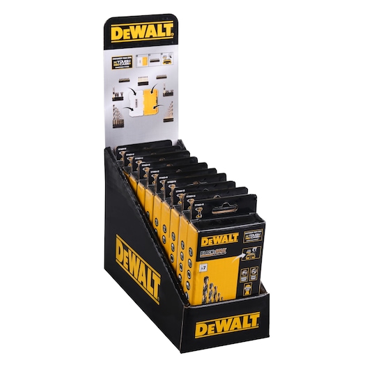 A retail display stand holding multiple boxes of DEWALT drill bit sets. The packaging is yellow and black with DEWALT branding prominently shown on the stand and boxes.