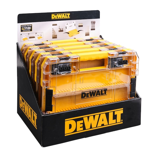 Display of DEWALT ToughCase yellow and transparent storage cases in a black branded box, showing organized tool storage cases designed for drill bits and accessories.