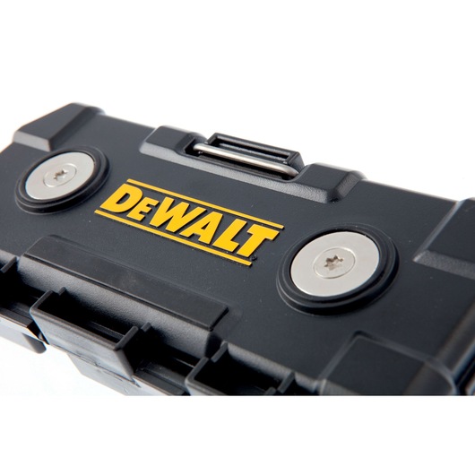 Close-up of a black DEWALT tool case with yellow logo and metallic latches on the cover.
