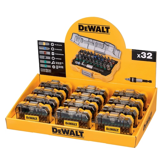 Display box showing multiple DEWALT bit sets, each in a transparent plastic case, with a yellow DEWALT logo and branding. The display highlights that each set contains 32 pieces.
