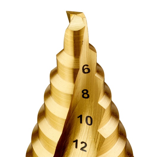 Close-up of a gold DEWALT step drill bit with size markings visible on the spiral.