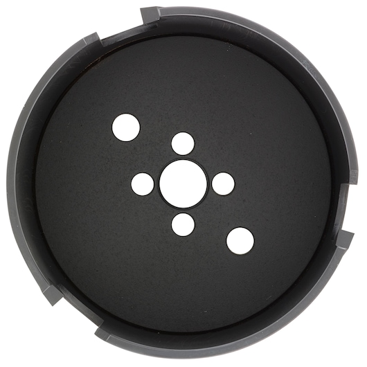 A circular black metal hole saw with multiple holes in the center, viewed from above against a white background.