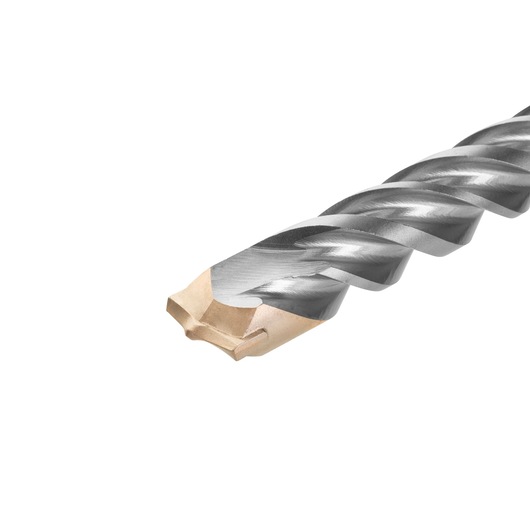 Close-up of the tip of a DEWALT DT9590 drill bit with a spiral flute design and a carbide tip.